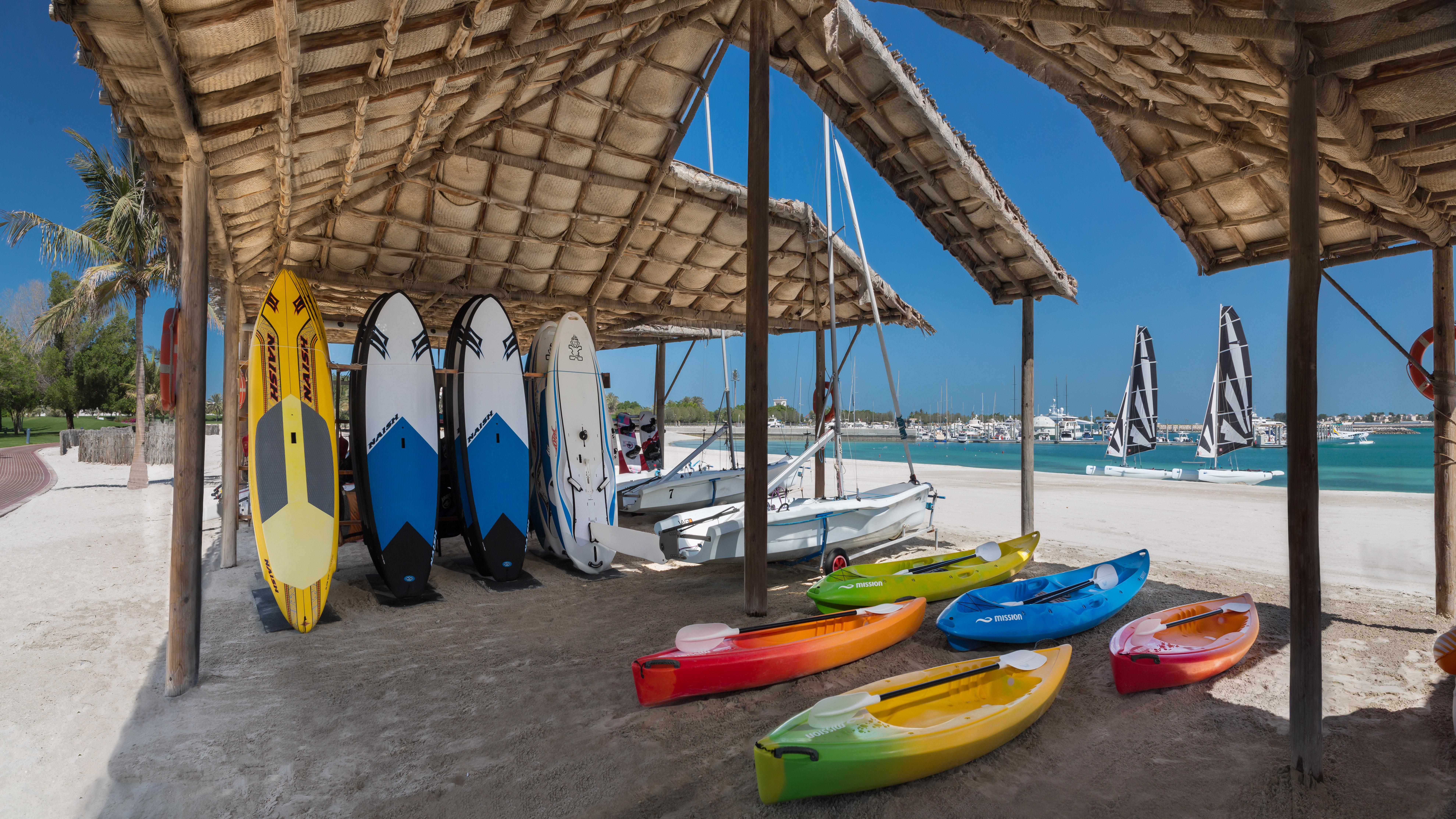 Emirates Palace Mandarin Oriental, Abu Dhabi Exterior photo Kayaks and surfboards at the beach